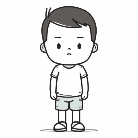 Boy standing and looking sad.